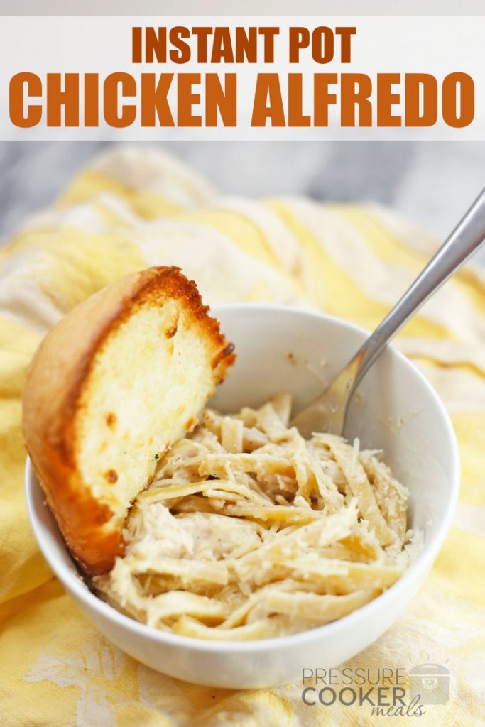 Instant Pot Chicken Alfredo in a white bowl with a slice of garlic bread and pinterest overlay text