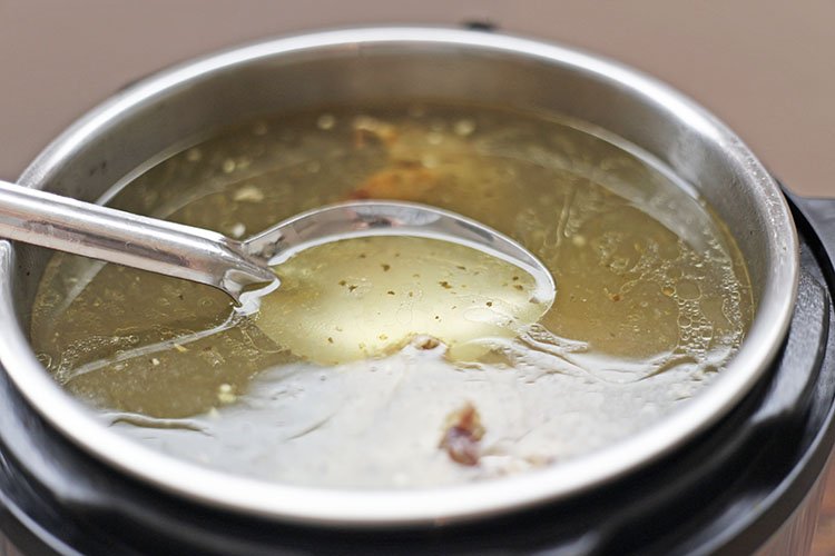 spoonful of easy homemade instant pot chicken stock