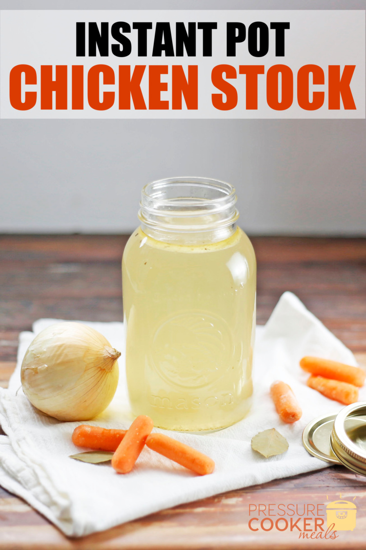 homemade instant pot chicken stock in jar with veggies on table