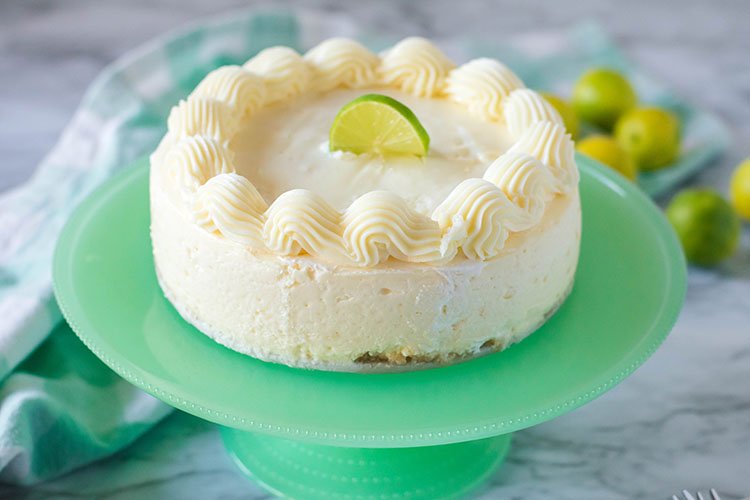 Instant Pot Key Lime Cheesecake on Green Cake Stand