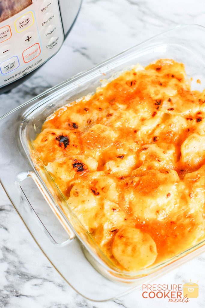 Easy Instant Pot Au Gratin Potatoes with browned cheese on top