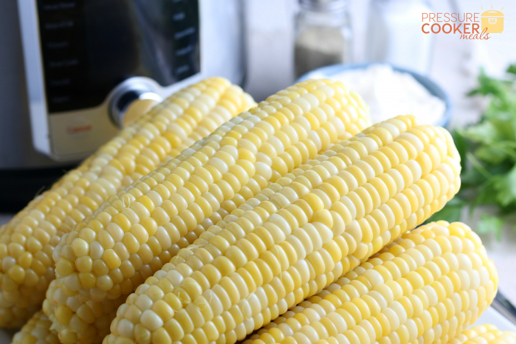 Instant Pot Corn on the Cob stacked on a plate